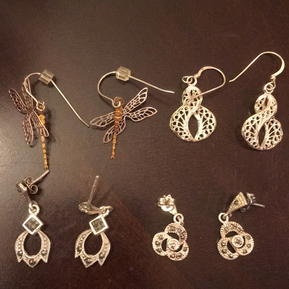 Four pair silver earrings